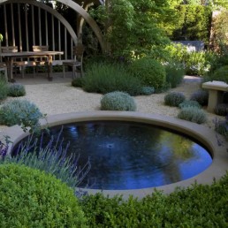 Stone edged circular pond